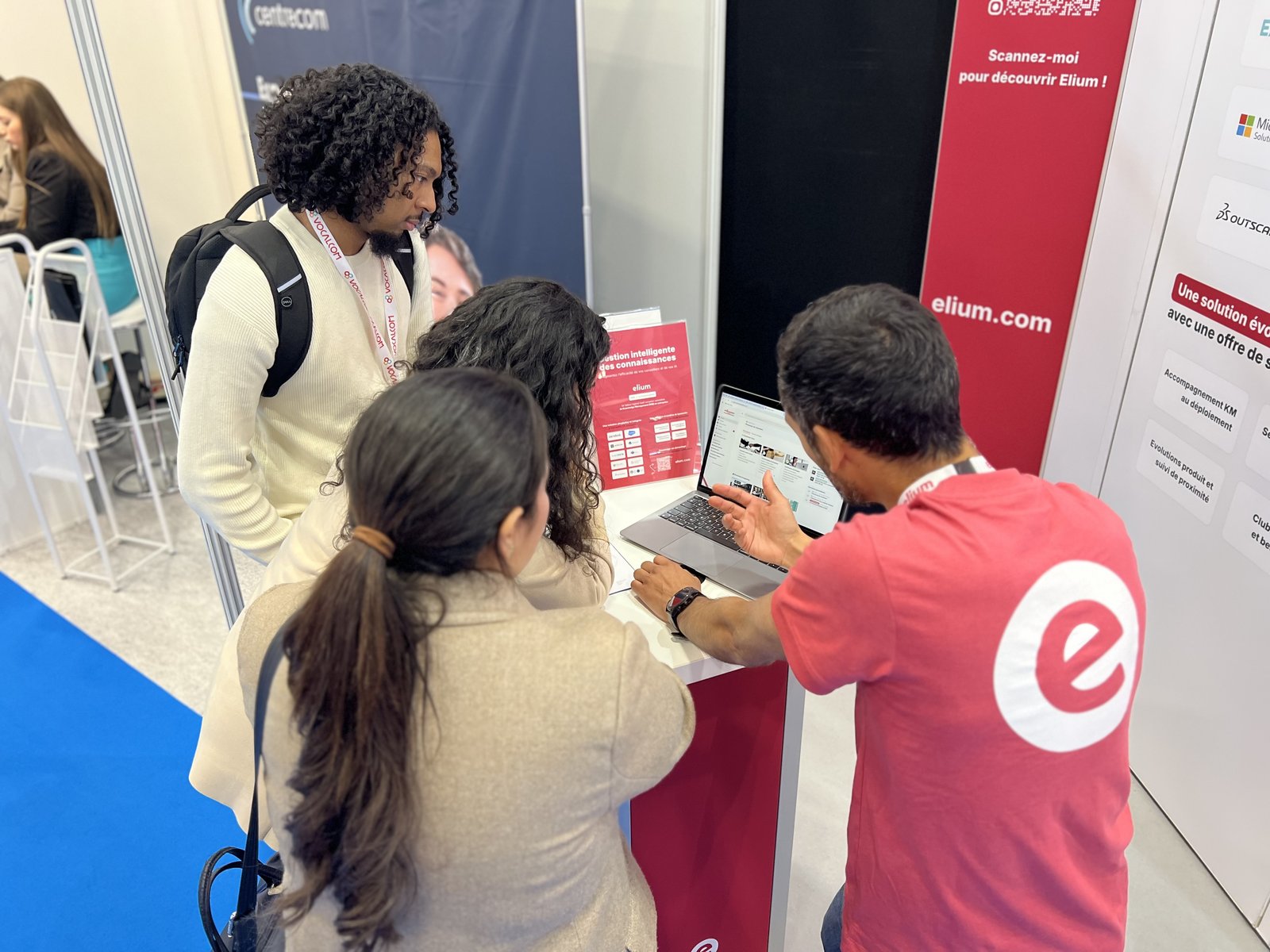 A product demo on a laptop at the Elium stand